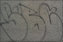 Graffiti removal from a grey wall in Eugene