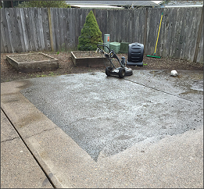 Pressure washed patio in a Eugene backyard