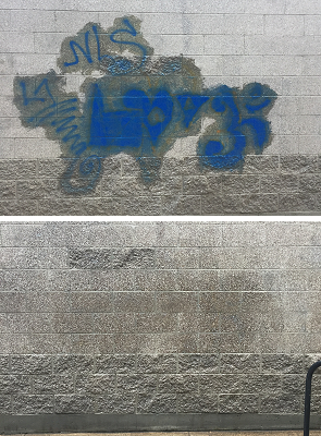 Graffiti removal from a downtown Eugene building